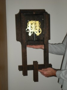Arts & Crafts wall clock, back view, showing motion works