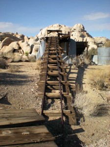 Rails for ore carts leading to top of stamp mill.