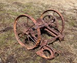 rusting_mechanical_equipment_wheel_lumber_harvest