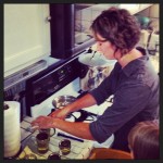 Master food preserver Rachel Davis demonstrates filling and sealing jars...Not too tight!
