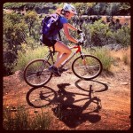 Mountain biker rides up South Fork American River Trail.