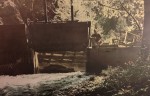 Campbell Creek diversion into the flume and water pipe carried by the suspension bridge to hydraulic mining activity near Salyer, CA,