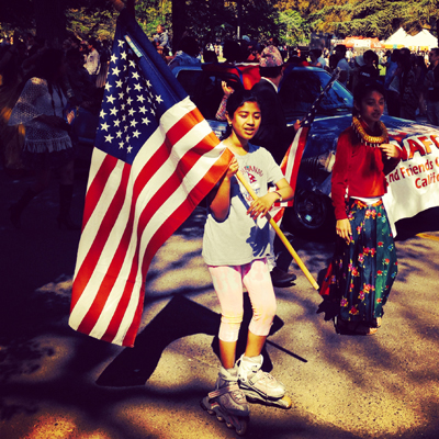 American flag on roller blades, UC Davis Picnic Day Parade.
