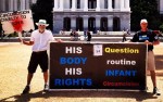 Brother K and Kevin Knauss hold the Sacramento Intactivist banner in front of the California Capitol.