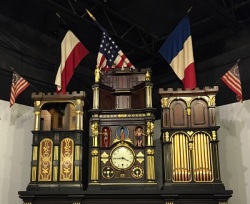 Top half of the Engle monumental clock on display at the National Association of Watch and Clock Collectors Museum.