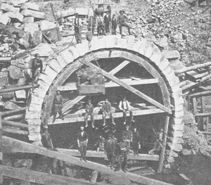 West portal of the Hoosac Tunnel, centering placement of finished stonework, 1874.