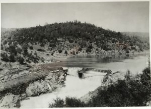 GGMC No 1 Showing Golden Gate Head-dam and head of Flume during construction. Waste-gate and South Wing of Dam open. Golden Gate Claim main or head dam on Feather River.