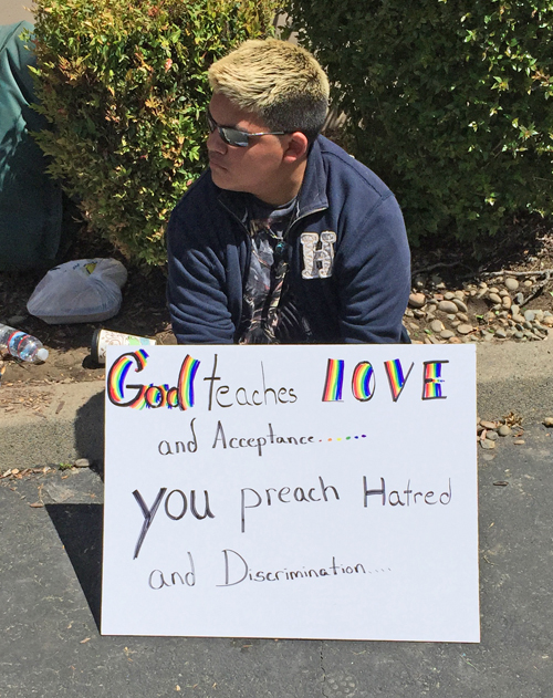 God_teaches_love_Verity_protester_Sacramento