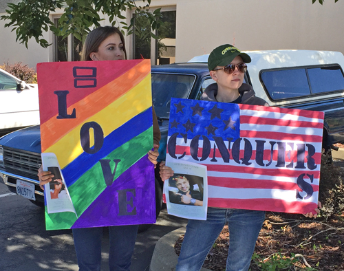 Love_conquers_Rainbow_signs_Verity_protest