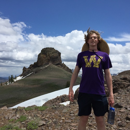 Walker Knauss, home from Williams College, hikes to Jeff Davis Peak.
