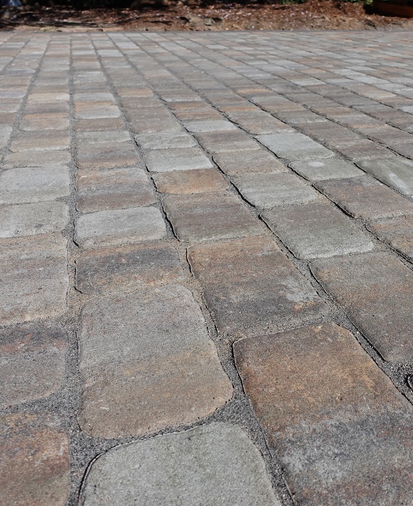 Calstone Belgian Stone, Sequoia Sandstone color, in running bond pattern parallel to street.