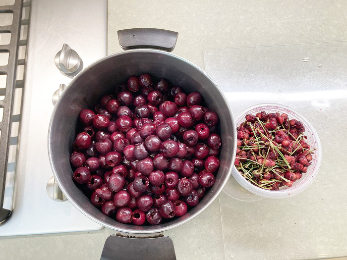 It takes about 15 or 20 minutes to pit the cherries. Then they are ready to be cooked.
