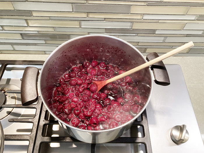 Within a few minutes, over a low heat, the cherries will begin to release their juice and aroma as they cook down.