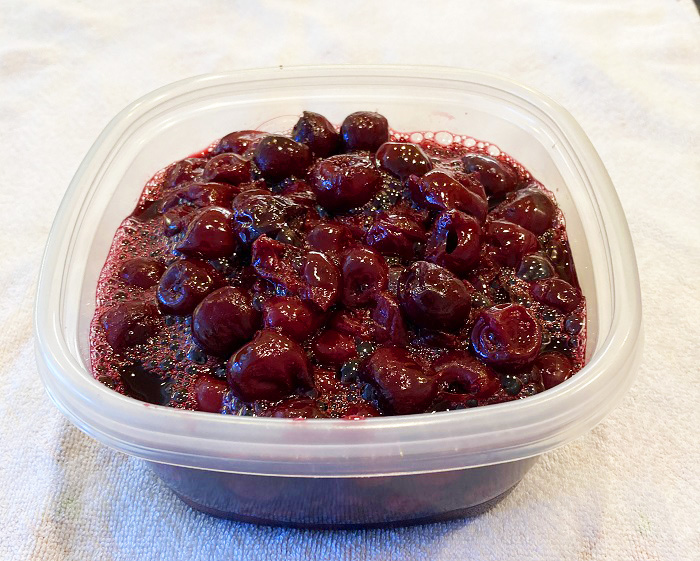 I place the stewed cherries in a plastic bowl in the refrigerator and dish out daily at breakfast and dessert.