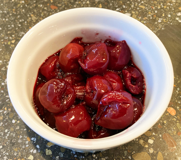 The finished cherry compote with have some firm cherries, some are a little mushy, and plenty of flavorful cherry juice.