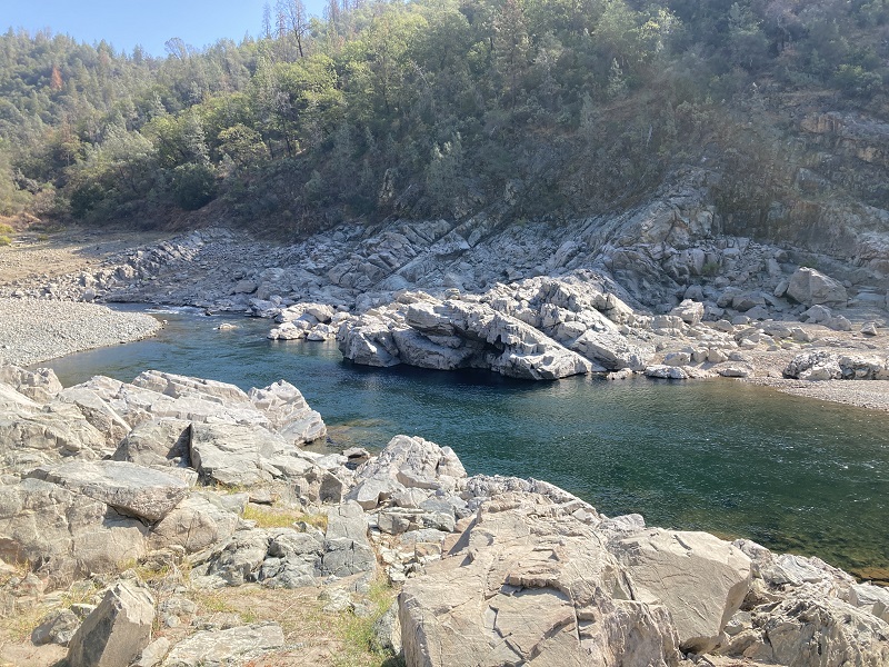 The river will curve around debris in the riverbed. Substantial amounts of rock flowed into the river from the early construction of Auburn Dam, diversion tunnel, and failure of the coffer dam.