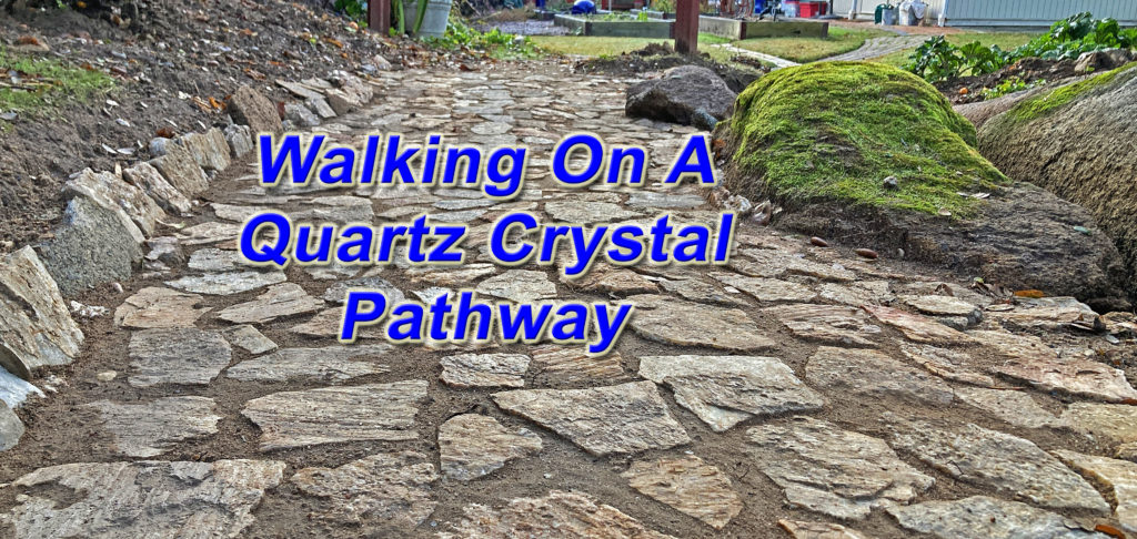 Backyard path constructed with quartz rock with quartz crystals inside.