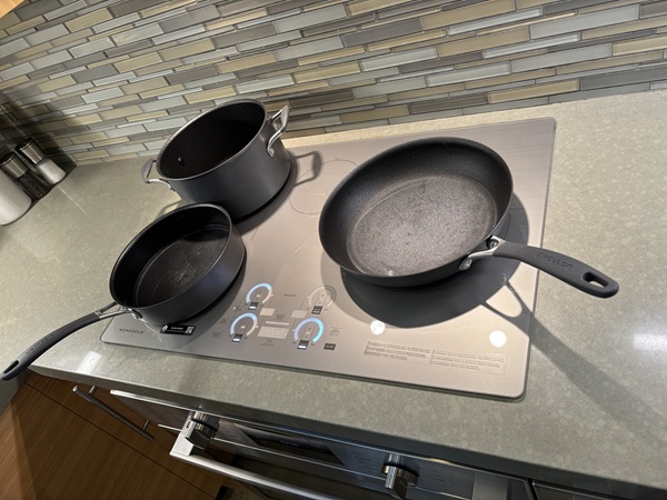 The new set of pots and pans we had to buy to work with the induction cooktop.